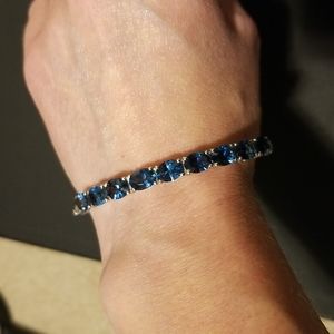 Sterling silver bangle with blue stones